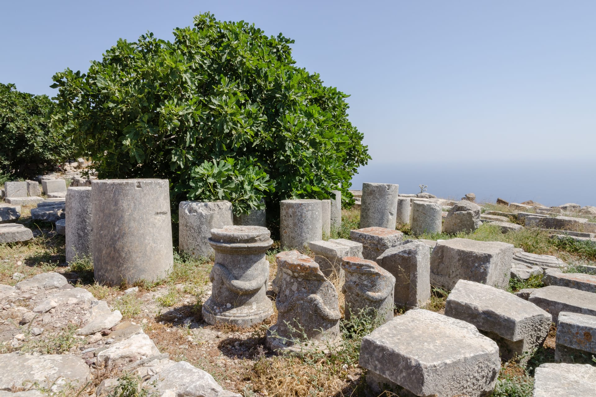 The ruins of Ancient Thera on the ridge of Mesa Vouno above Kamari, Santorini