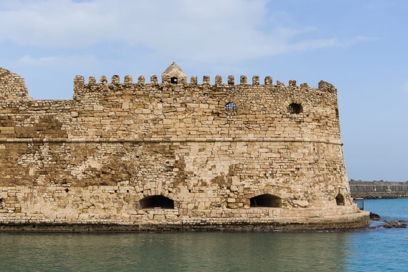 Detail of the eastern part of the venetian fortress (Koulès) at Harbour of Heraklion, Crete, Greece. The breakwater in background