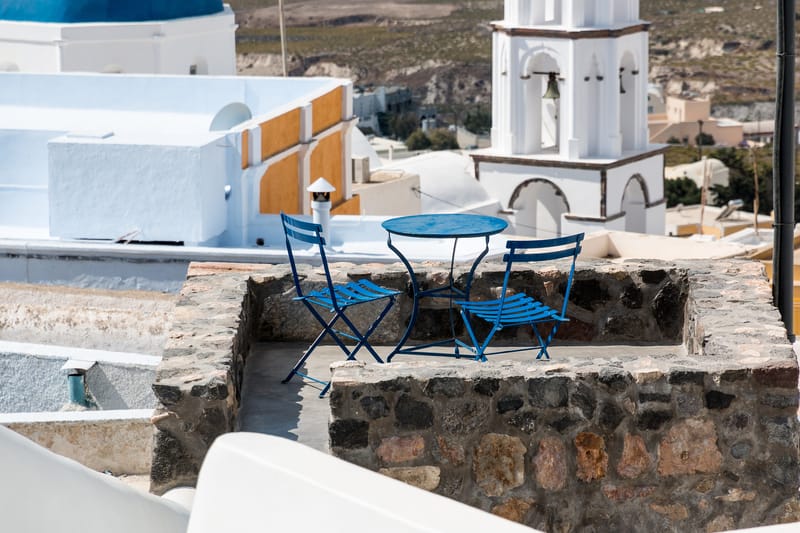 Table with chairs in Pirgos Kallistis, Santorini, Greece