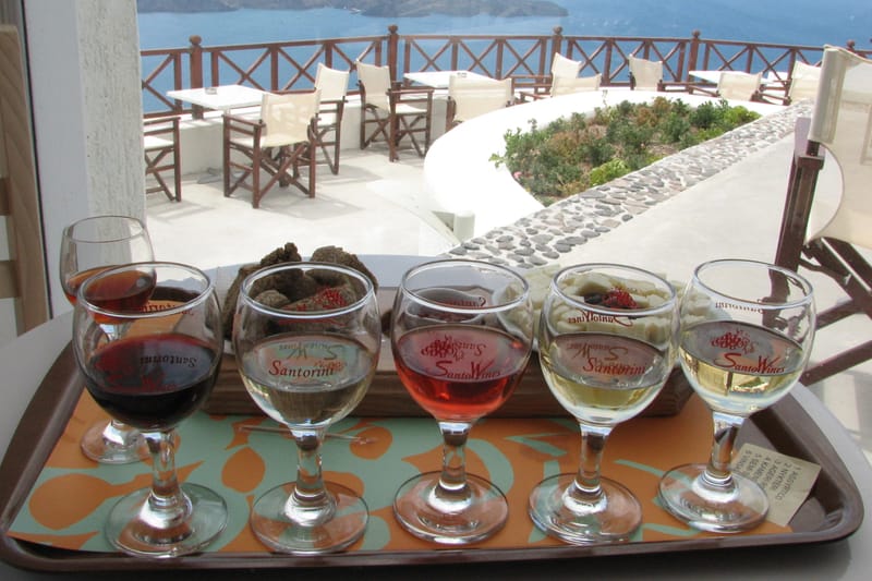 Several examples of Greek wines from Santorini ranging from whites with no oak, slightly oaked whites, roses and red wines