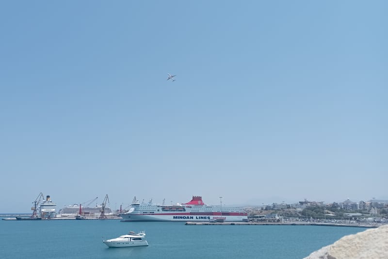 The port of Heraklion seen from the Koules fortress: a ferry alongside the passenger quay, a cruise ship and the cranes behind it